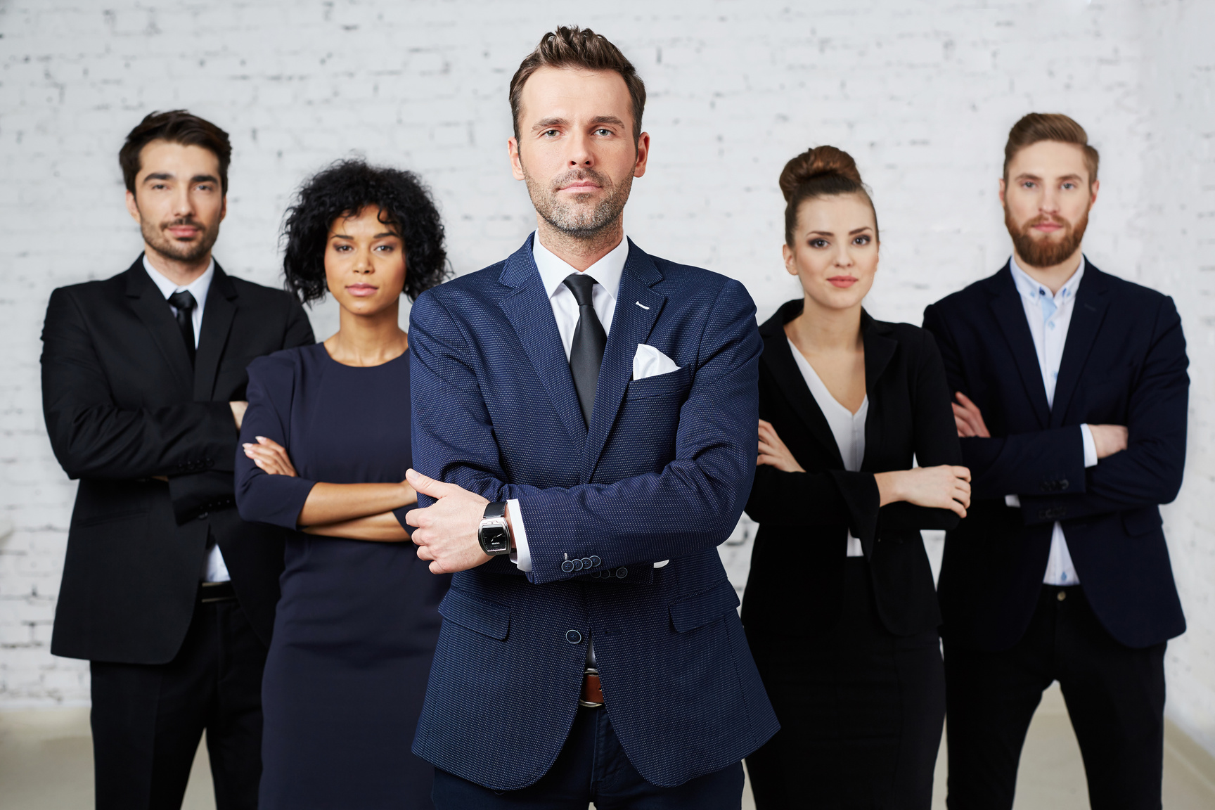 Group of confident, perky lawyers standing together